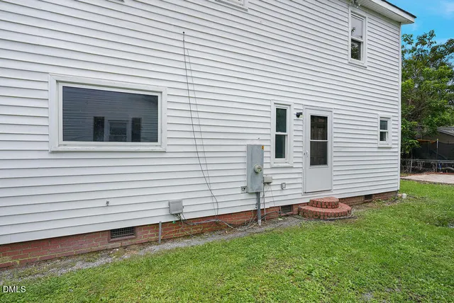 a view of a backyard with a garden