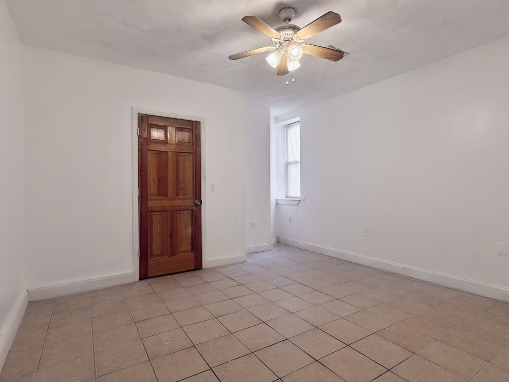 455 Washington Street Haverhill, MA 01832 - Photo 13 of 42 wooden floor in an empty room with a window