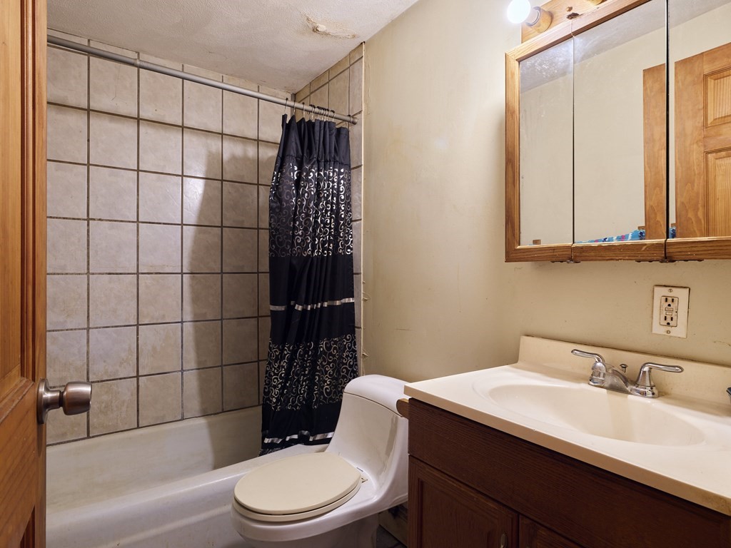455 Washington Street Haverhill, MA 01832 - Photo 27 of 42 a bathroom with a sink toilet and shower
