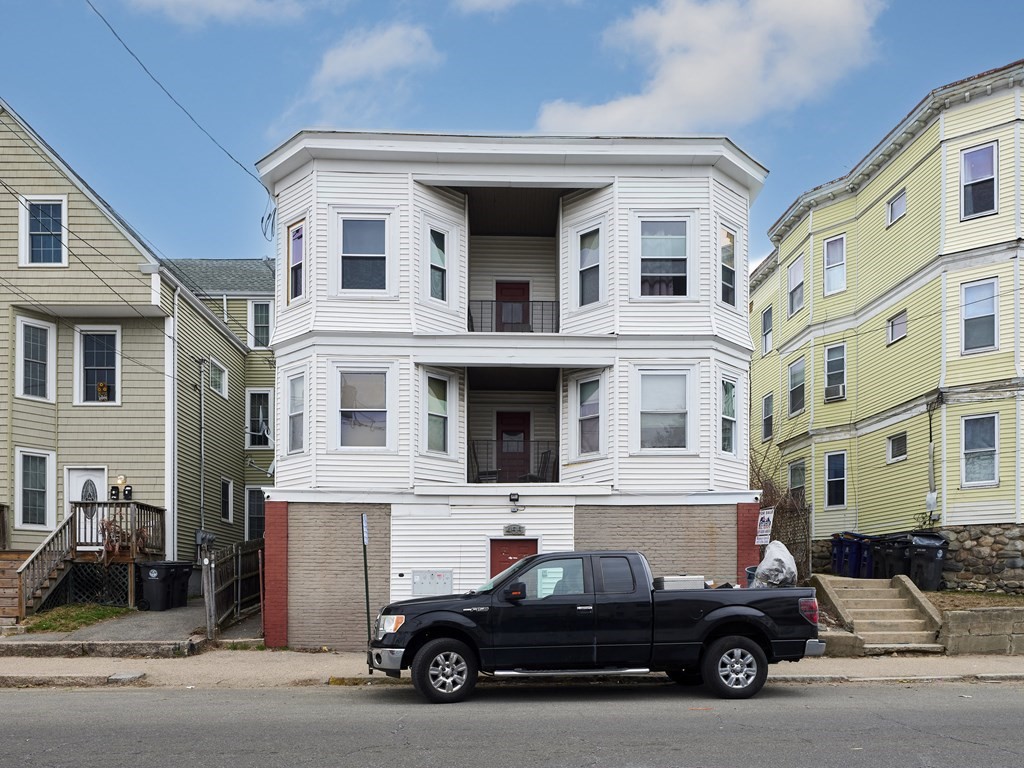 455 Washington Street Haverhill, MA 01832 - Photo 3 of 42 a car parked in front of a building