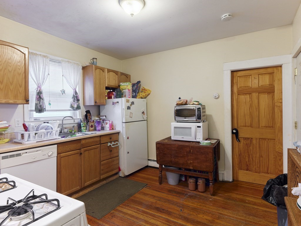 455 Washington Street Haverhill, MA 01832 - Photo 31 of 42 a room with furniture a rug and a window