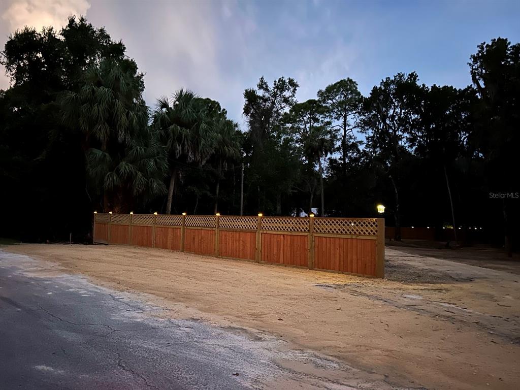 34 Palm Drive Inglis, FL 34449 - Photo 1 of 18 a view of house with a yard