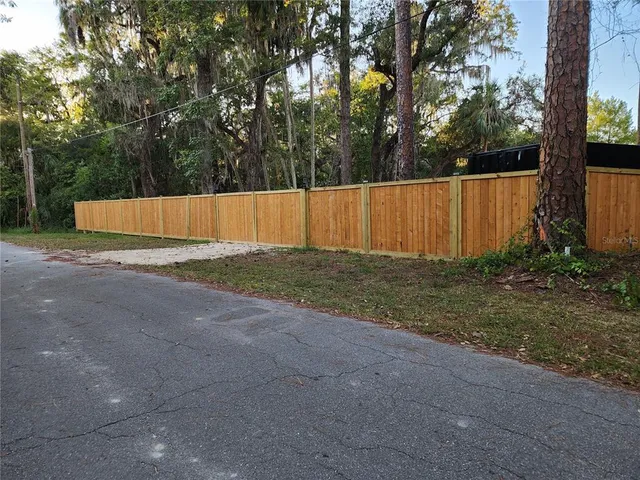 a view of backyard with green space