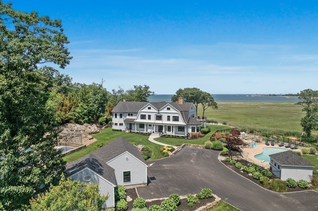 20 Wood Island Road Scituate, MA 02066 - Photo 2 of 14 an aerial view of a house with a garden
