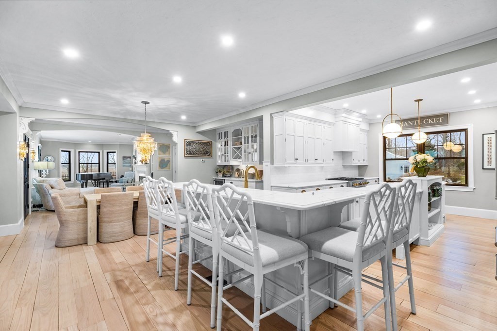 20 Wood Island Road Scituate, MA 02066 - Photo 5 of 14 a large kitchen with a table and chairs