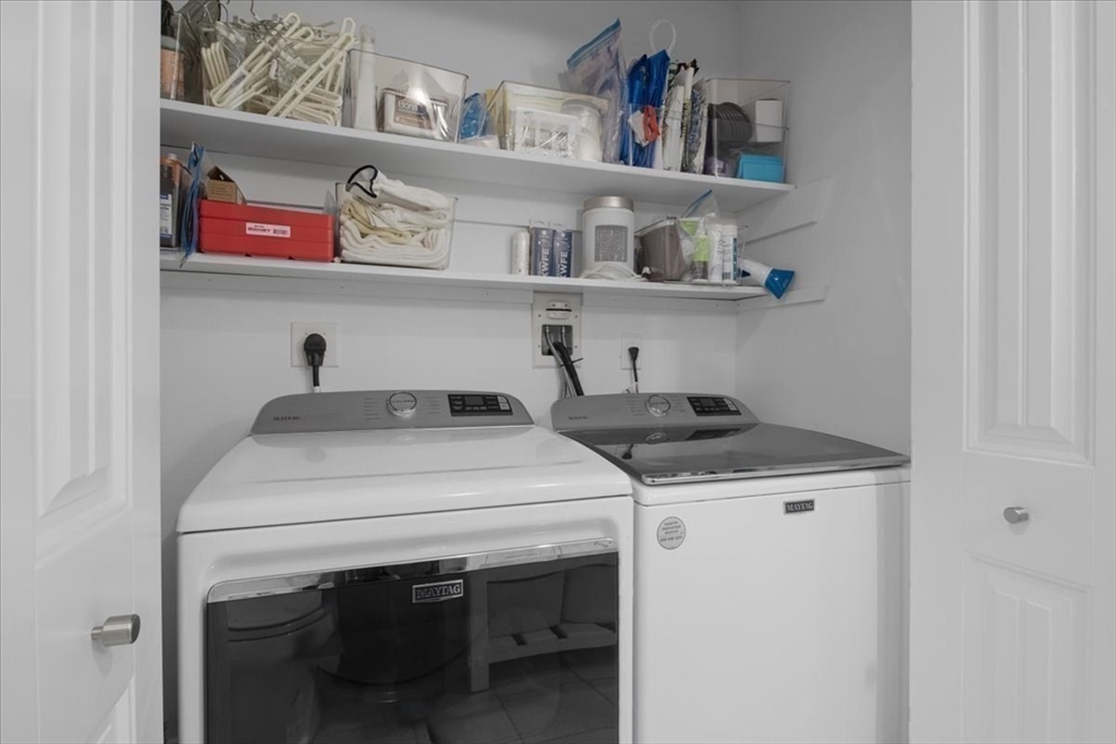 91 Front Street, Unit 308 Scituate, MA 02066 - Photo 24 of 27 a utility room with dryer and washer