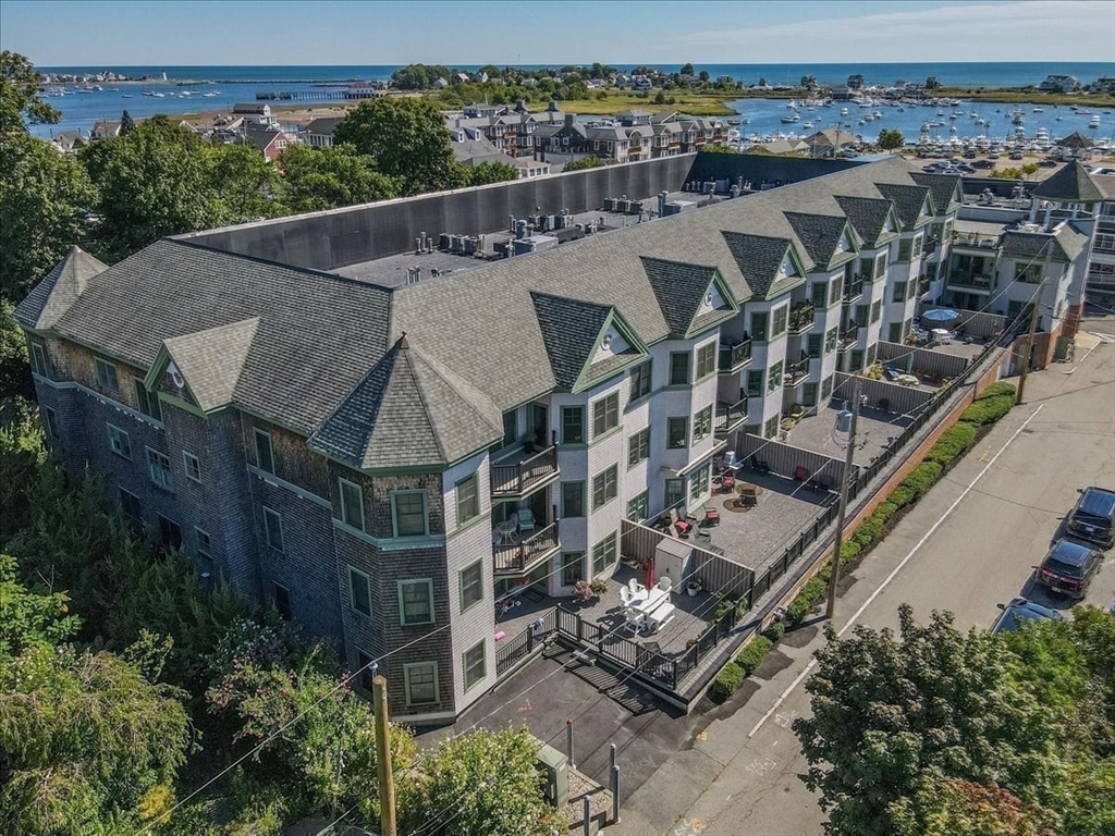91 Front Street, Unit 308 Scituate, MA 02066 - Photo 26 of 27 an aerial view of a house with a yard