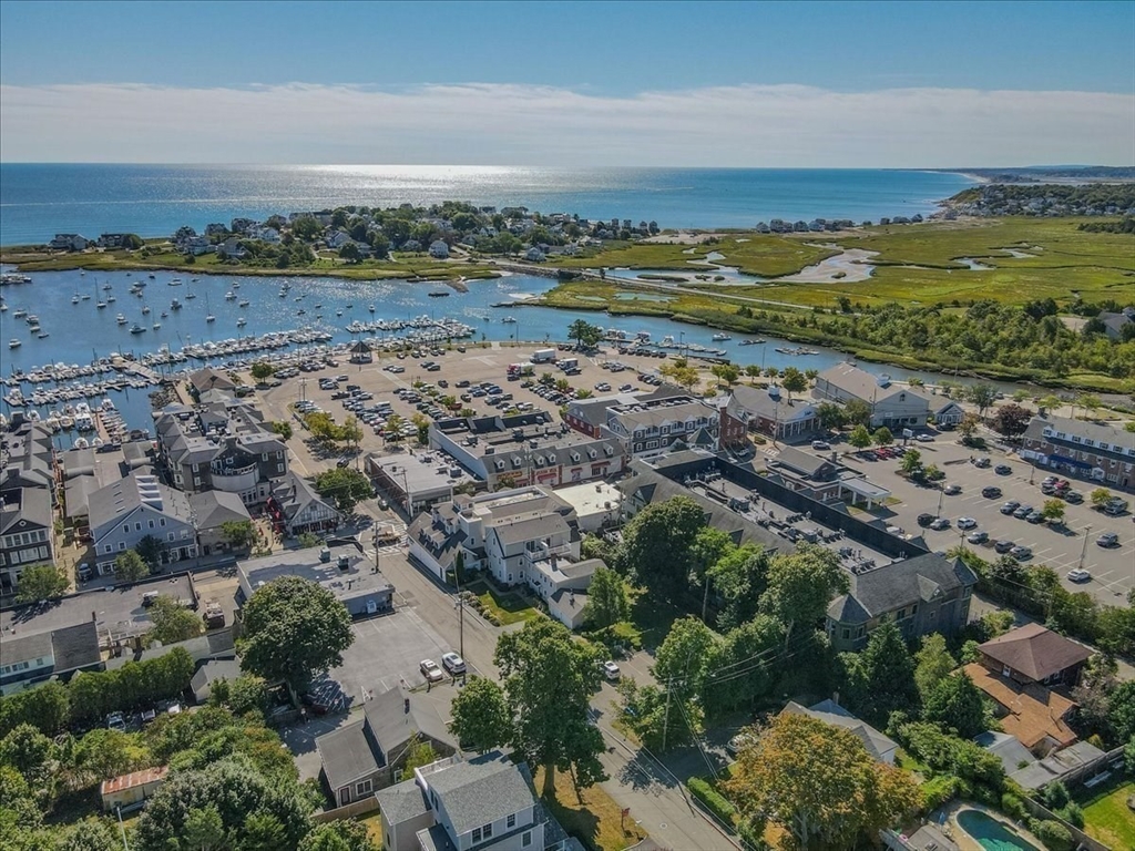 91 Front Street, Unit 308 Scituate, MA 02066 - Photo 3 of 27 an aerial view of a beach and lake view