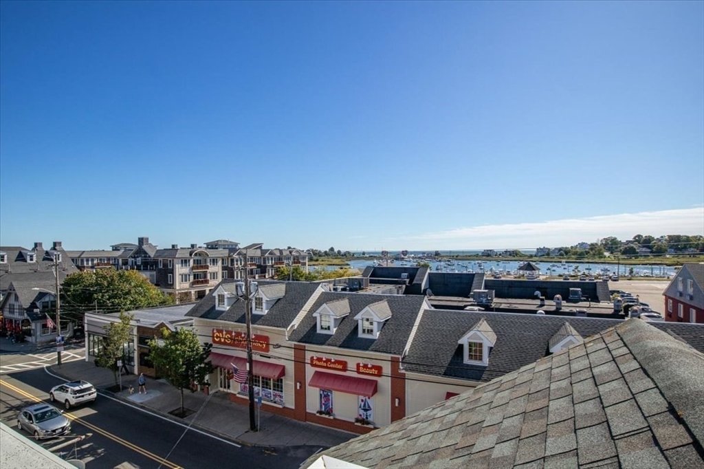 91 Front Street, Unit 308 Scituate, MA 02066 - Photo 4 of 27 a view of a city from a terrace