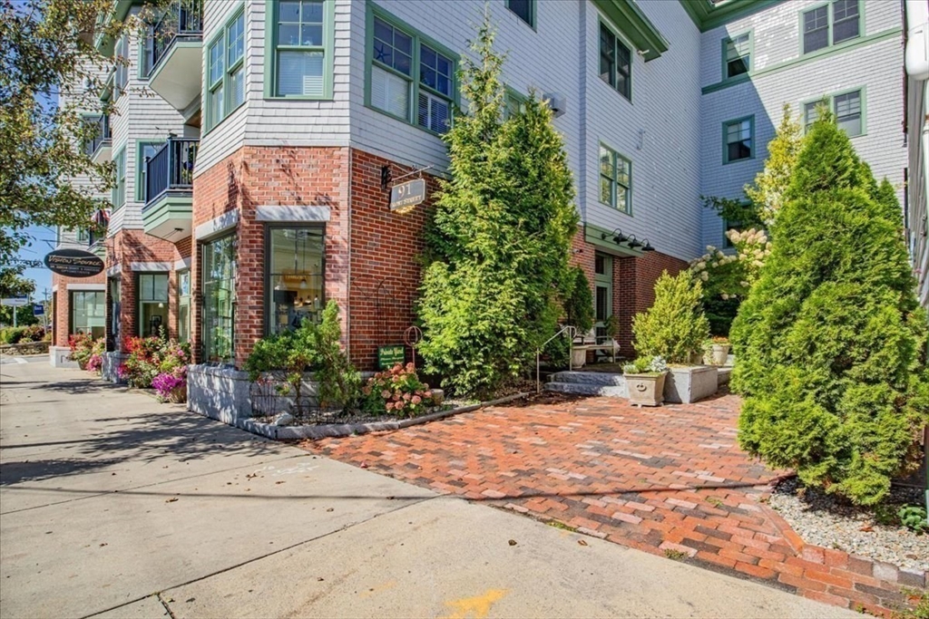 91 Front Street, Unit 308 Scituate, MA 02066 - Photo 6 of 27 a view of a building with potted plants