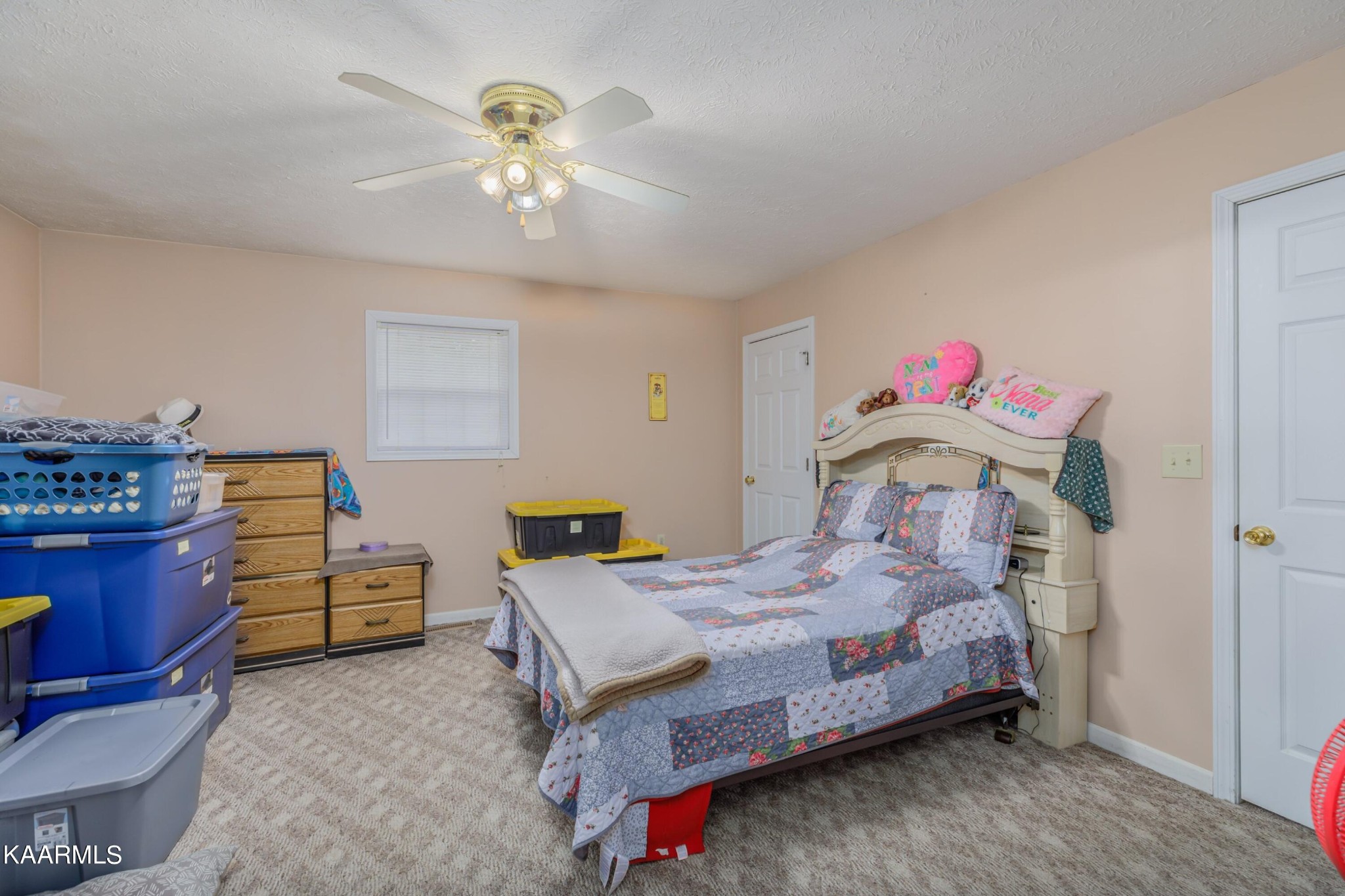 3226 Bogard Road Cosby, TN 37722 - Photo 13 of 35 a bedroom with a bed and a chandelier