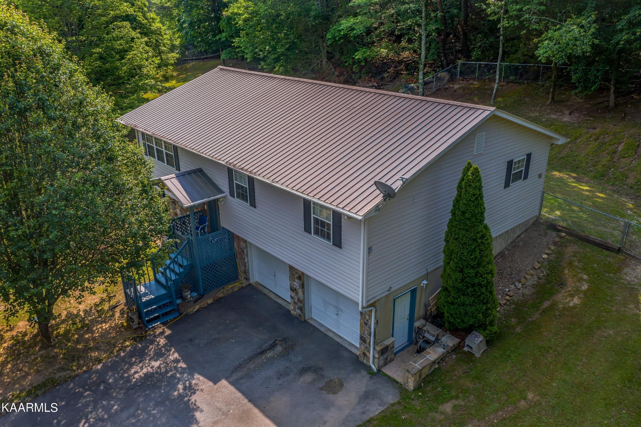 3226 Bogard Road Cosby, TN 37722 - Photo 27 of 35 a aerial view of a house with a yard balcony and garage
