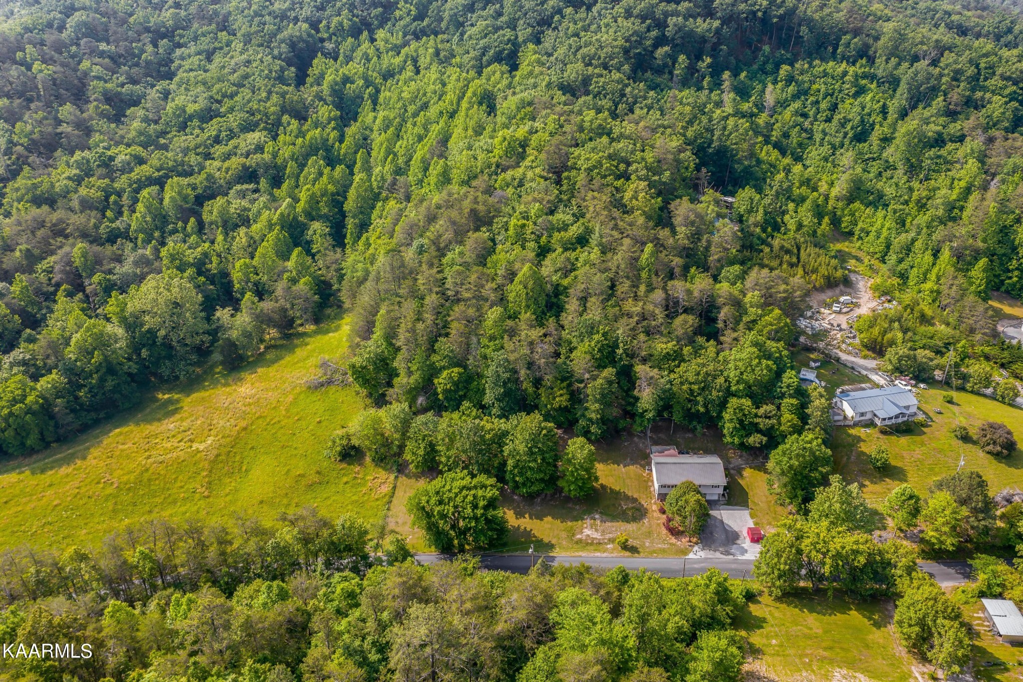 3226 Bogard Road Cosby, TN 37722 - Photo 31 of 35 a view of a lake with a house