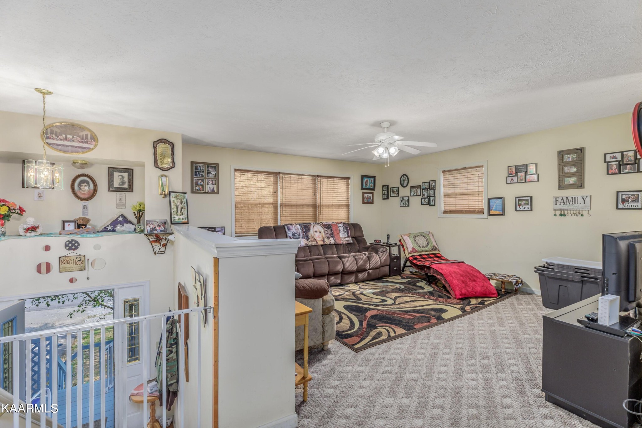 3226 Bogard Road Cosby, TN 37722 - Photo 6 of 35 a bed room with a bed and a couch