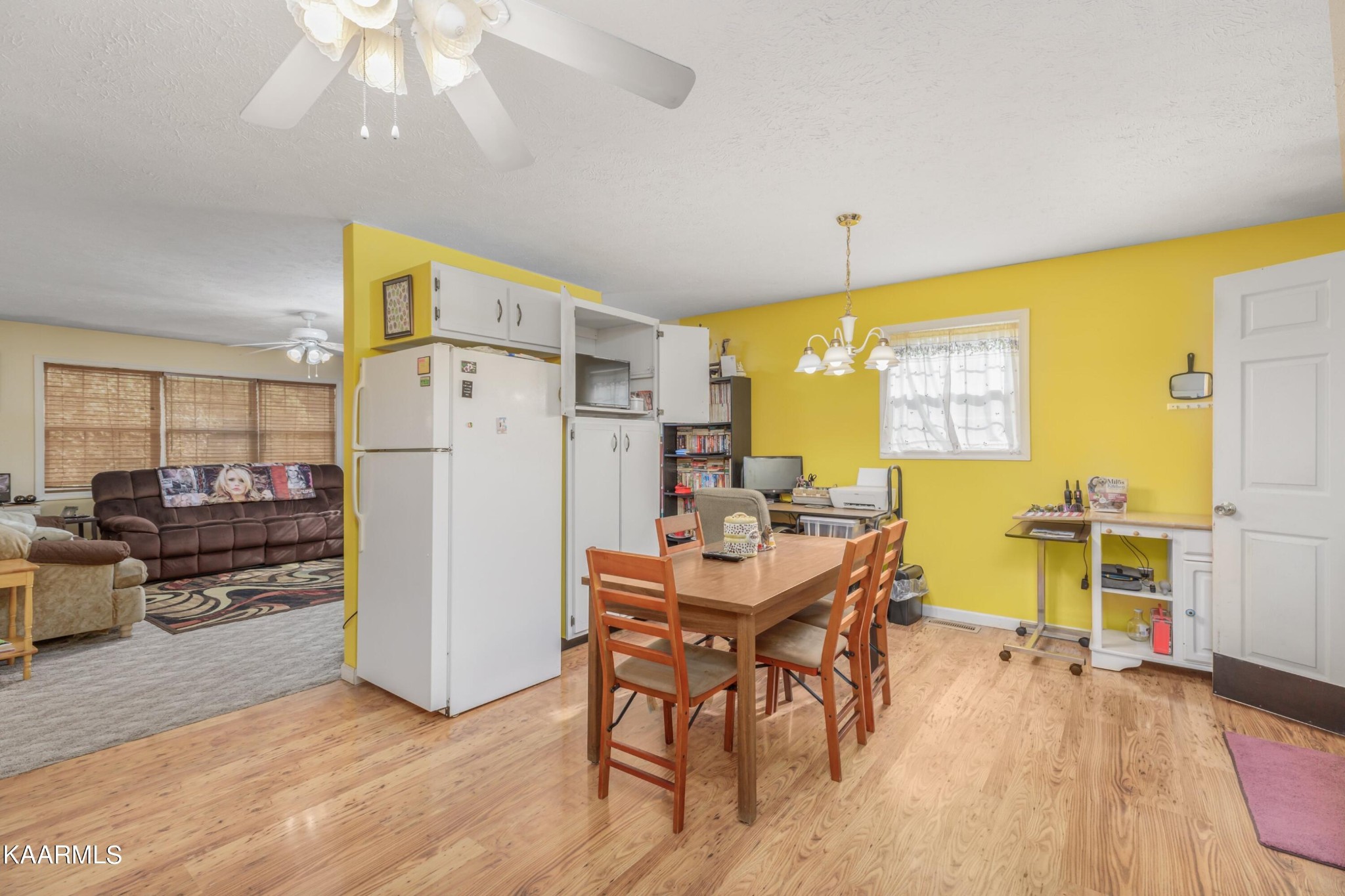 3226 Bogard Road Cosby, TN 37722 - Photo 8 of 35 a view of a dining room with furniture window and wooden floor