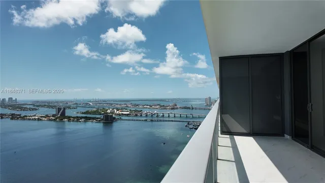 a bathroom with a tub and shower