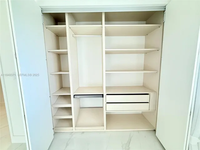 a room with furniture and a clock