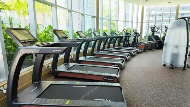 a view of a living room and bathroom