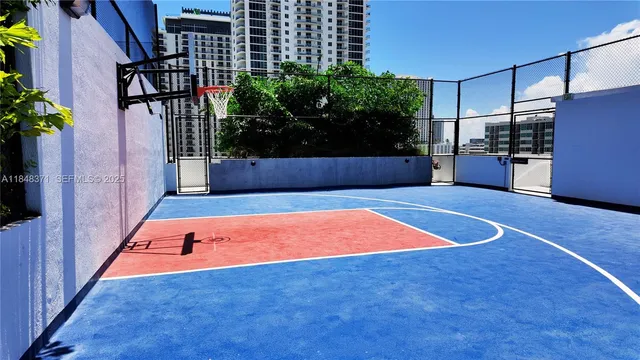 a living room with furniture and a rug
