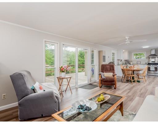 276 Lakeview Drive Winchendon, MA 01475 - Photo 12 of 37 a living room with furniture and a large window