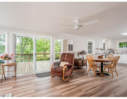 276 Lakeview Drive Winchendon, MA 01475 - Photo 13 of 37 a living room with furniture a table and a large window