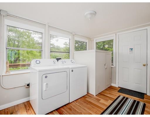 276 Lakeview Drive Winchendon, MA 01475 - Photo 18 of 37 a bathroom with a sink a mirror and next to a window