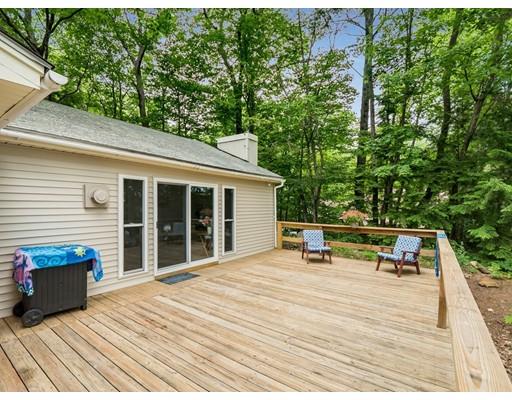 276 Lakeview Drive Winchendon, MA 01475 - Photo 22 of 37 a view of a deck with chairs and plants