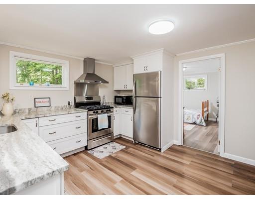 276 Lakeview Drive Winchendon, MA 01475 - Photo 6 of 37 a kitchen with a refrigerator and a stove top oven