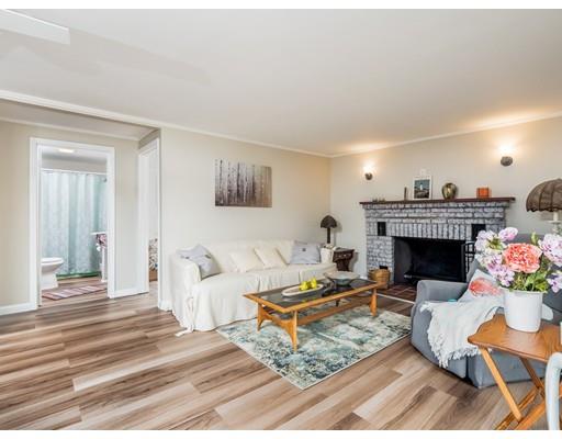 276 Lakeview Drive Winchendon, MA 01475 - Photo 8 of 37 a living room with furniture and a fireplace