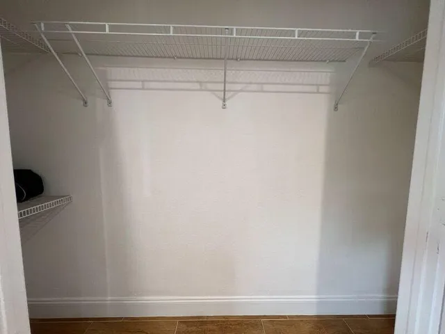 a close up view of racks on the wall