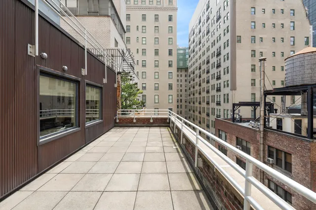 a view of balcony with lots of lights