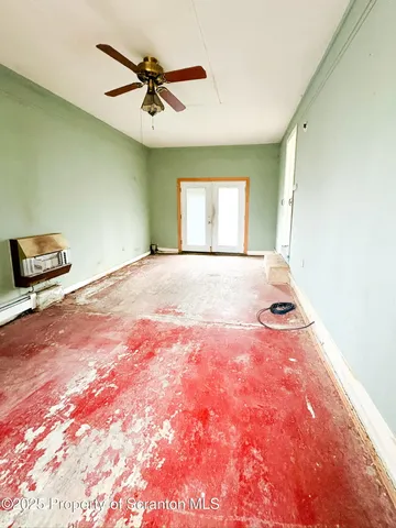 a view of a livingroom with a staircase