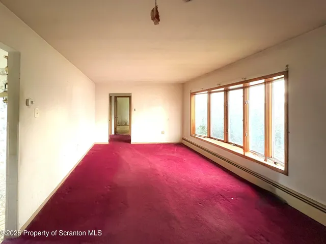 a view of empty room with window