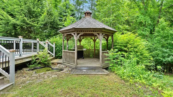 a view of backyard with green space