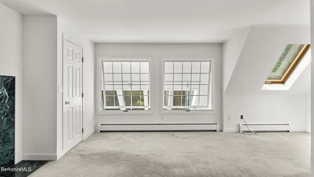 an empty room with windows