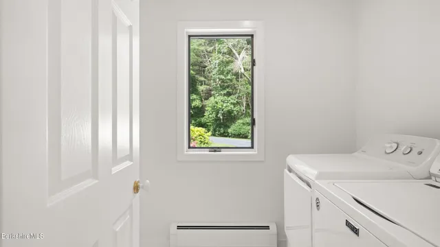 a view of an empty room with a sliding door