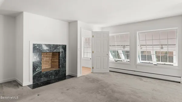 an empty room with windows