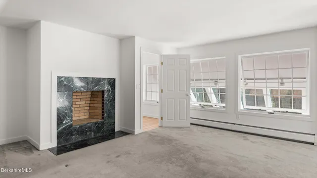 an empty room with windows