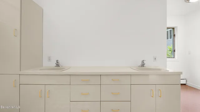 a view of an empty room with a large window