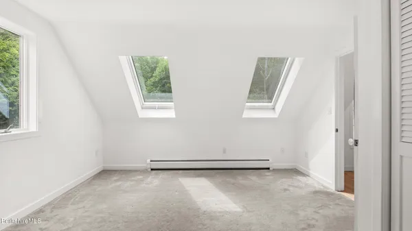 an empty room with windows