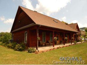 565 Jenkins Road Canton, NC 28716 - Photo 2 of 22 a view of a house with a yard