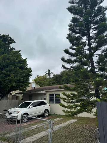a view of multiple house with a yard