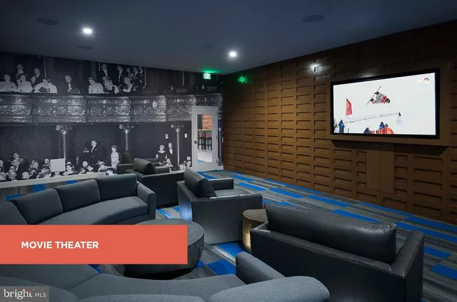 a room with lots of furniture and air hockey table