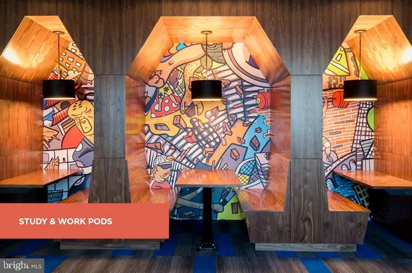 a view of a black and white wall with an outdoor space