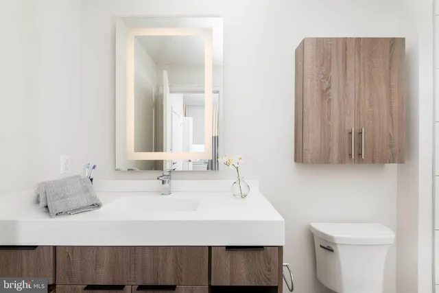 a view of a dining room with furniture and window