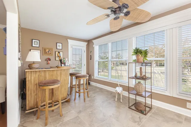 a living room with furniture and a table