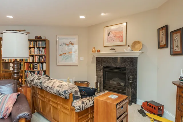 a spacious bathroom with a double vanity sink and mirror with shower