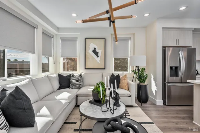 a living room with furniture and a table