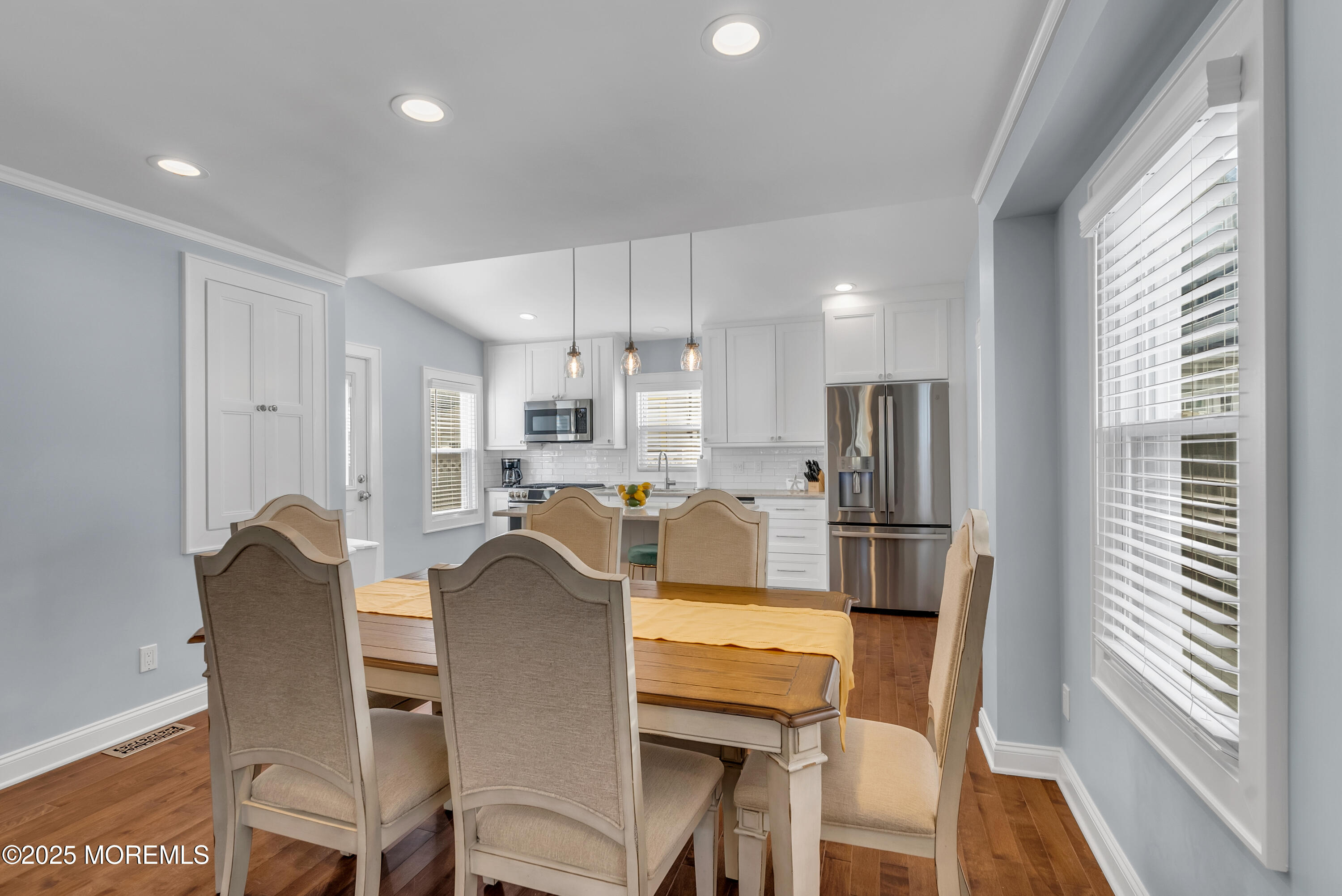 52 Embury Avenue Ocean Grove, NJ 07756 - Photo 16 of 88 a view of a dining room with furniture and a window