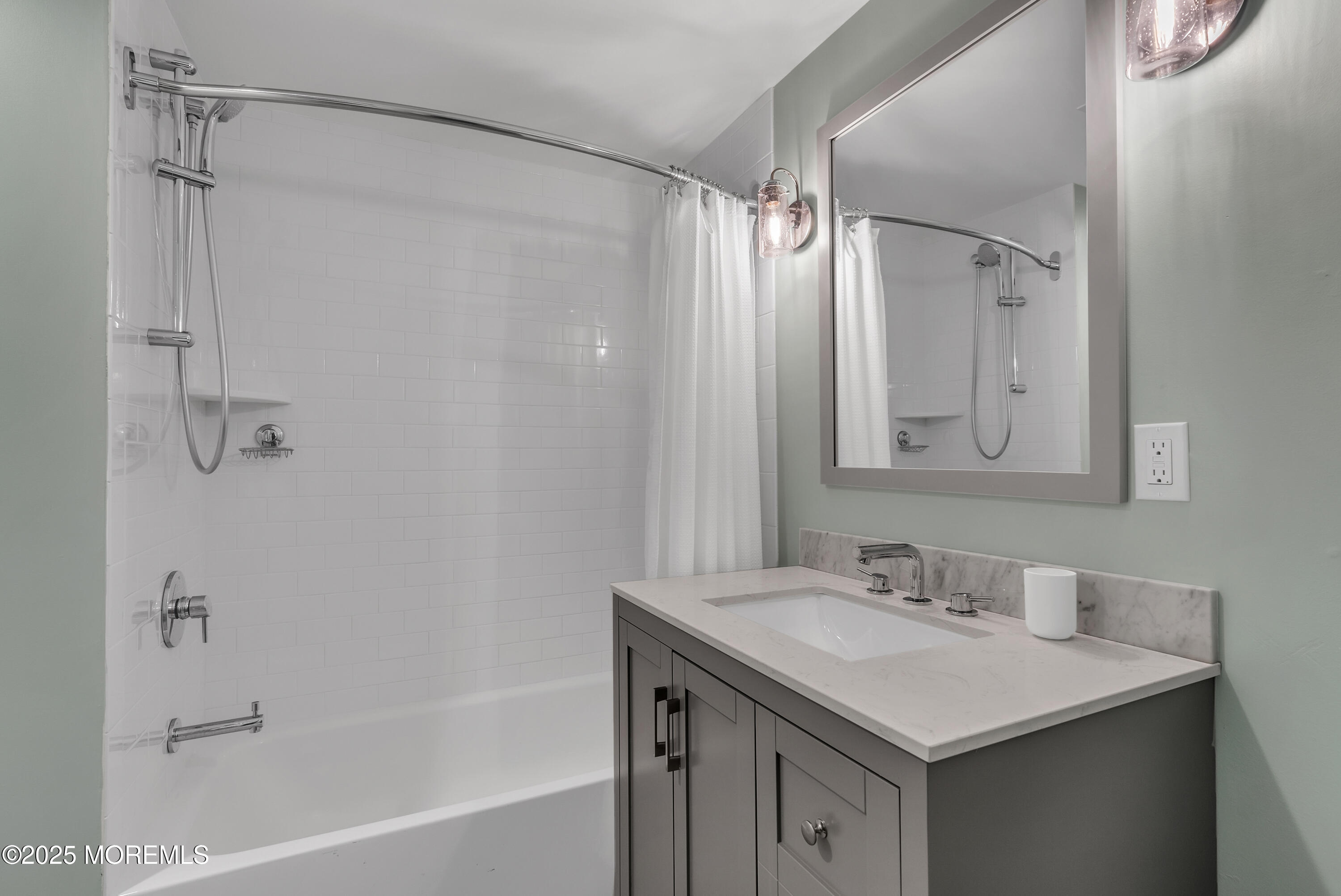 52 Embury Avenue Ocean Grove, NJ 07756 - Photo 31 of 88 a bathroom with a bath tub sink mirror and shower